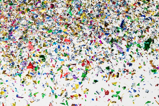 Colorful confetti pattern on a gray wallpaper