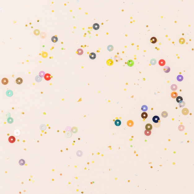 Free Photo colorful confetti peach orange wallpaper