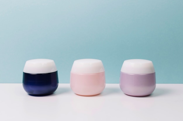 Colorful cosmetics jars