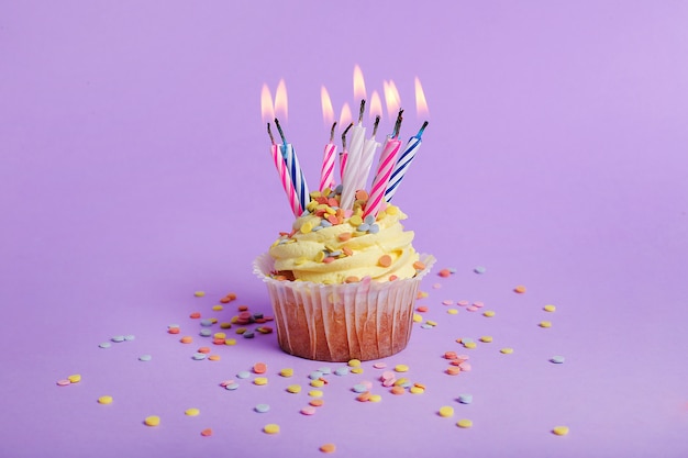 Colorful cupcake with candles