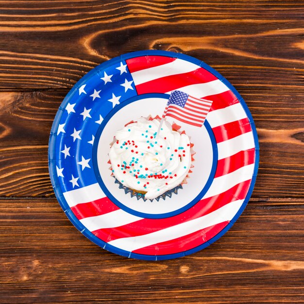 Colorful cupcake with small USA flag