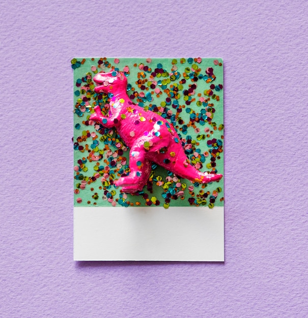 Free photo colorful  and cute miniature dinosaur figure