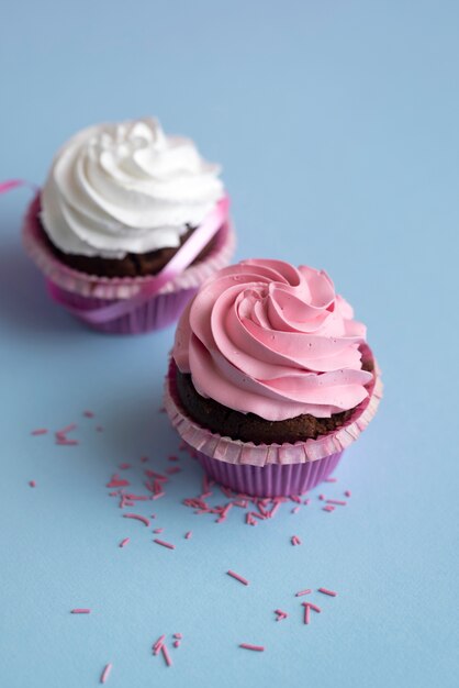 Colorful delicious cupcakes with frosting