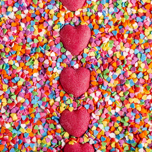 Free photo colorful delicious heart candies top view