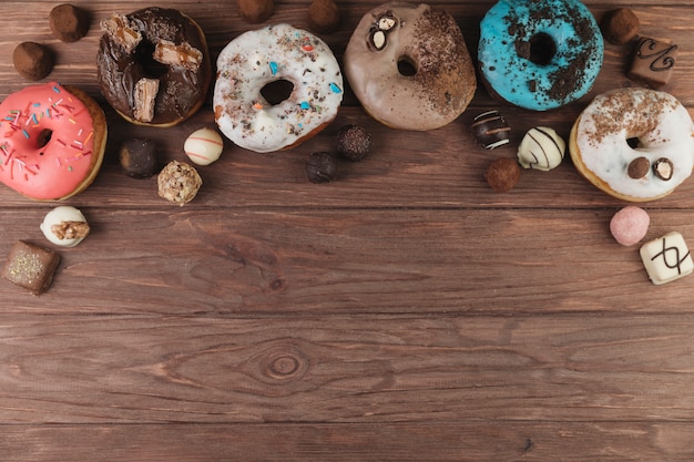 Free photo colorful donuts with chocolate