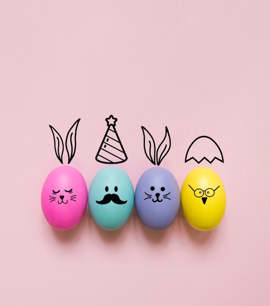 Free photo colorful easter eggs arrangement top view