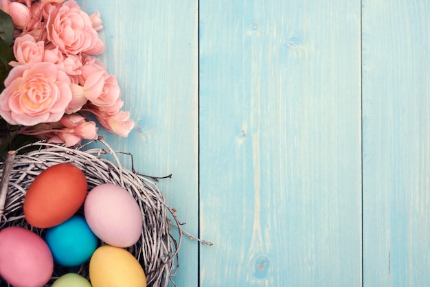 Free photo colorful easter eggs in the nest