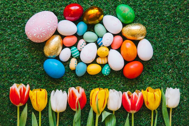 Colorful Easter eggs and tulips