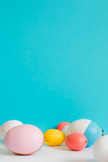 Colorful eggs on table