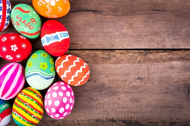 Colorful eggs on a wooden table