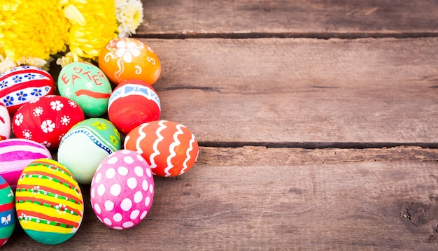 Colorful eggs on a wooden table