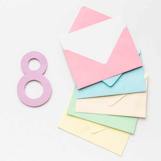 Colorful envelopes on white background