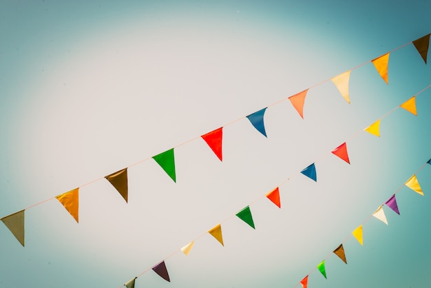 Free photo colorful flag on blue sky