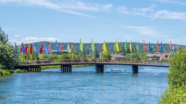 Colorful flags on a bridge