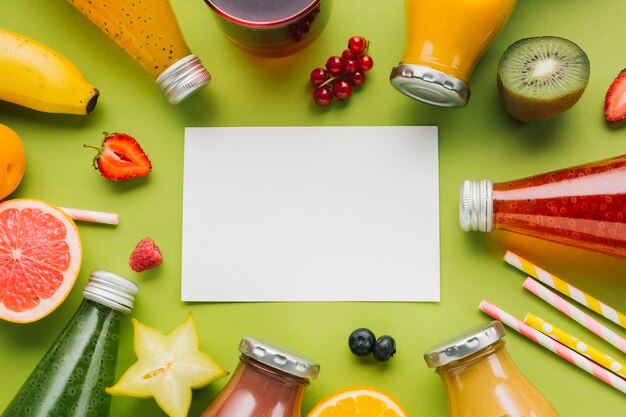 Colorful fruit and smoothies frame 