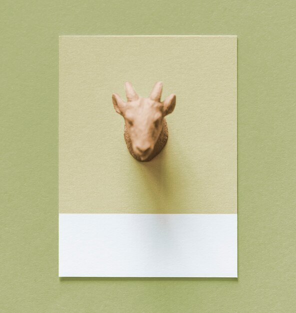 Colorful goat figure on a paper