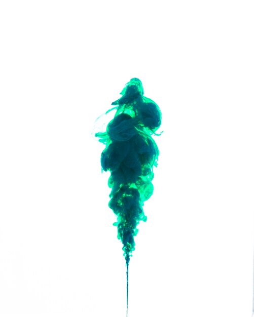 Colorful green ink in slow motion