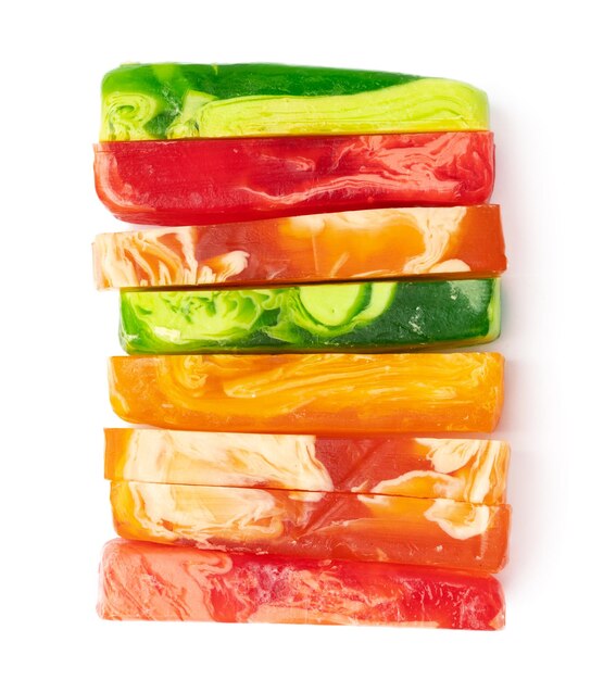 Colorful handmade soap bars on a white background