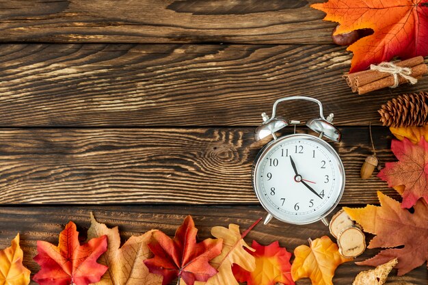 Colorful leaves frame with clock