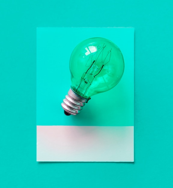 Colorful light bulb on a paper