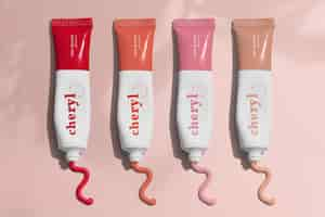 Free photo colorful lipstick shades in cosmetic tubes