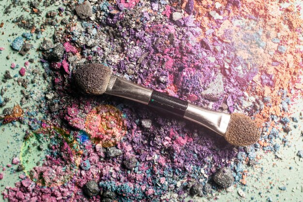 Colorful make up powder and brush