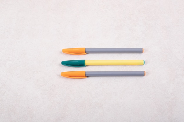 Colorful marker pens on white background