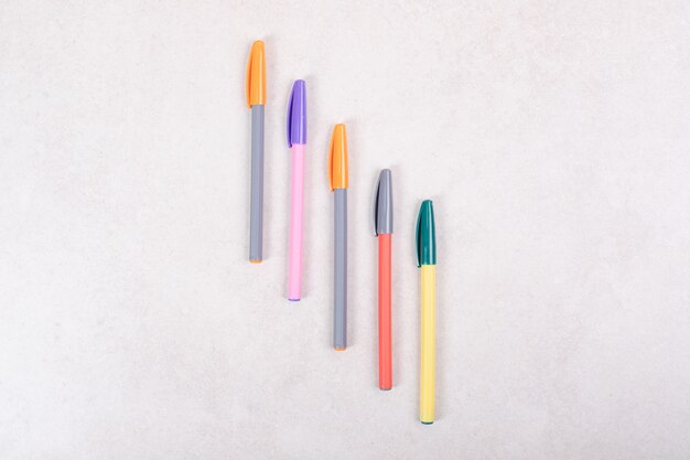 Colorful marker pens on white background