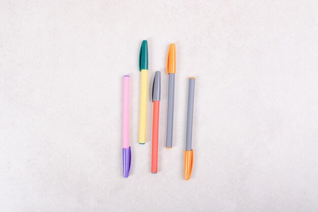 Colorful marker pens on white background
