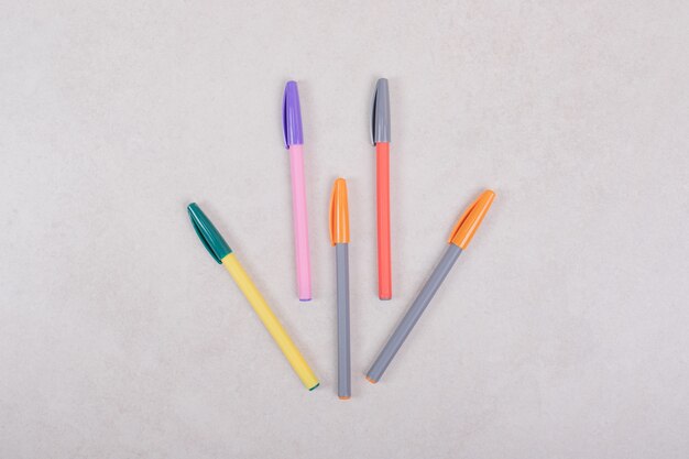 Colorful marker pens on white background