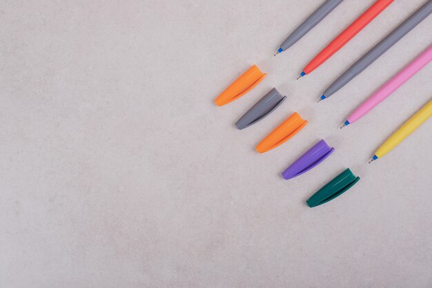 Free photo colorful marker pens on white background