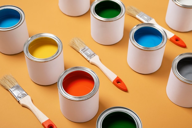 Colorful paint cans arrangement  high angle