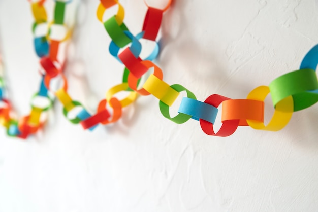 Free photo colorful paper chains still life