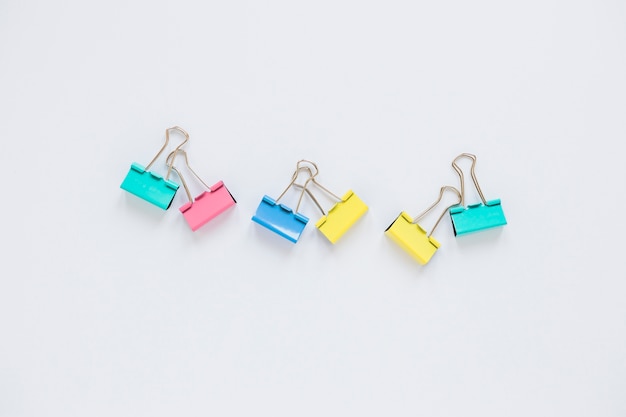 Colorful paper clips laid in middle