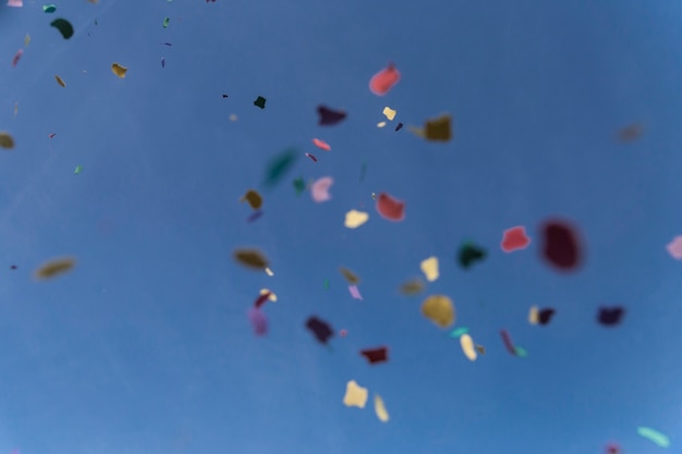 Colorful papers falling from the sky