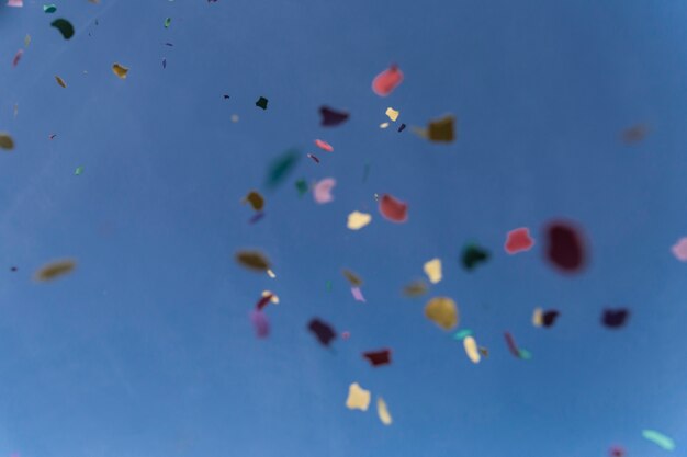 Colorful papers falling from the sky