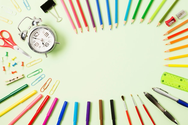 Colorful pens on a flat surface