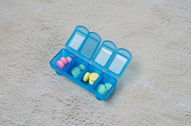 Colorful pills in box arrangement