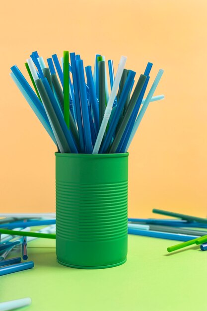 Colorful plastic straw collection in can