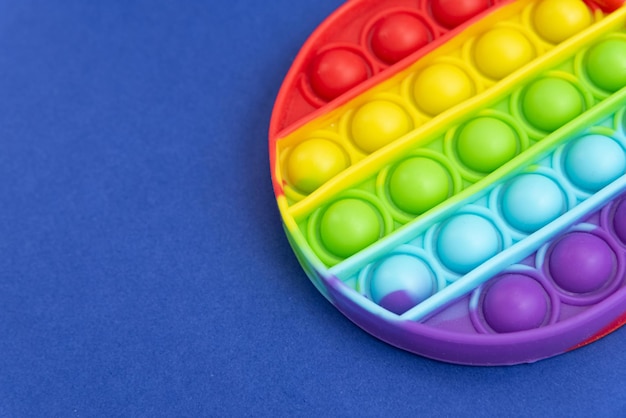 Colorful pop it toy over background - Close up