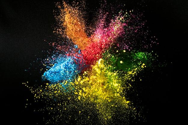 Colorful powder mix splash with dark background