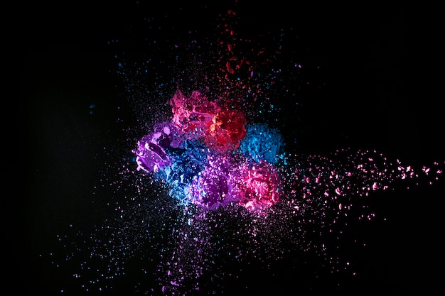 Colorful powder splash with dark background