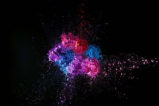 Colorful powder splash with dark background