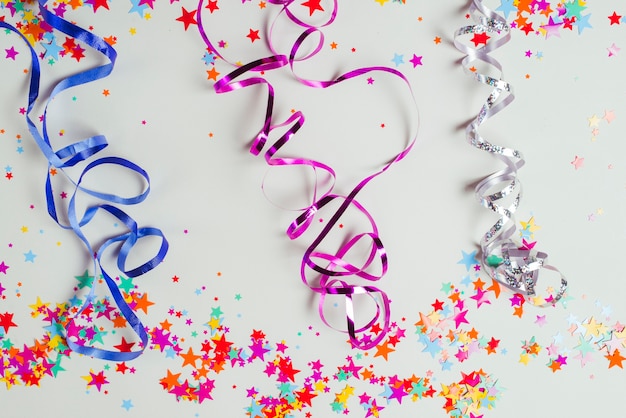 Colorful ribbons and confetti