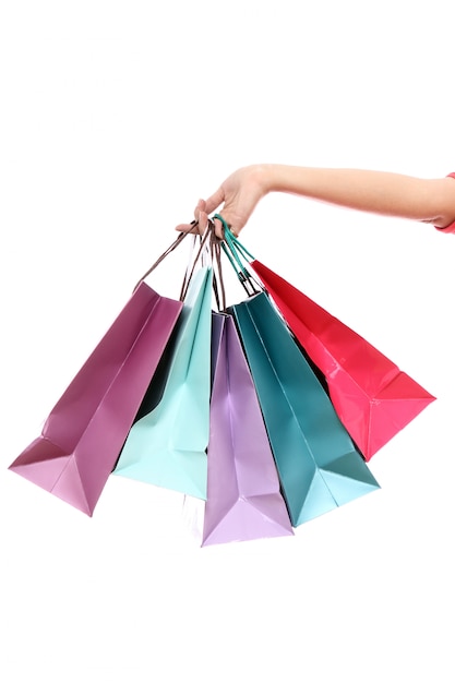 Colorful shopping bags in hand