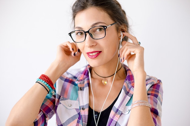 Colorful smiling woman in fashion glasses