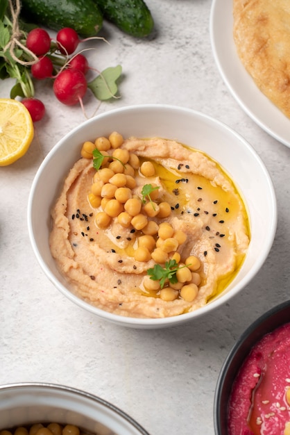 Colorful and tasty hummus with ingredients