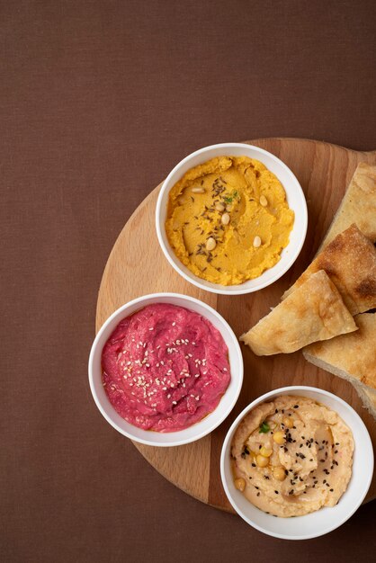 Colorful and tasty hummus with ingredients
