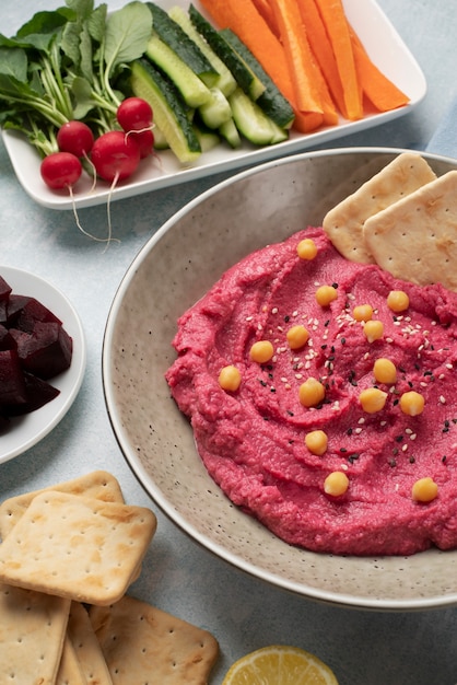 Colorful and tasty hummus with ingredients