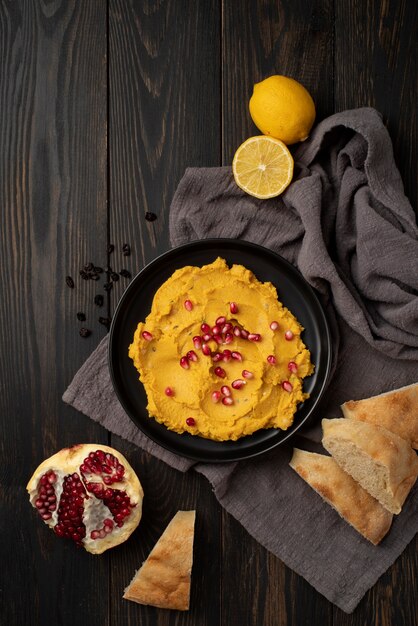 Colorful and tasty hummus with ingredients